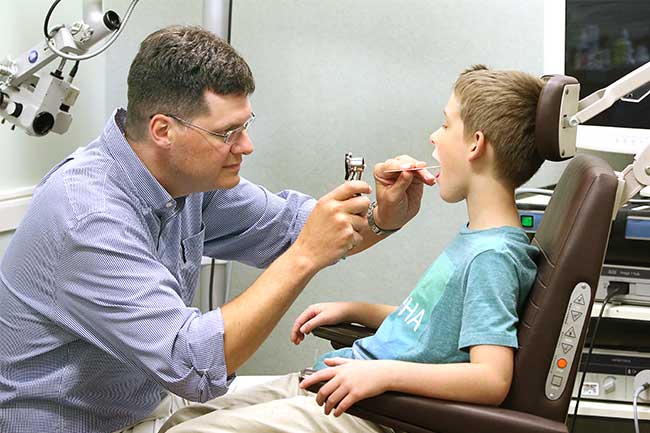 Dr. White with an ENT patient